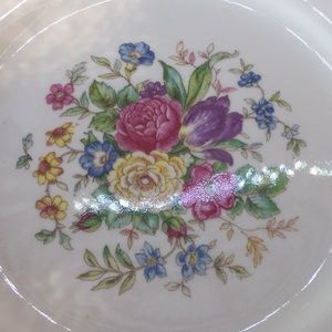 Small gold rimmed floral plate
